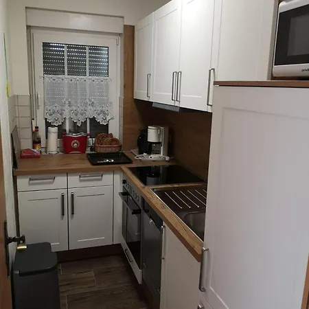 Holiday home Ostfrieslandtraum-mit-kamin-und-wintergarten *