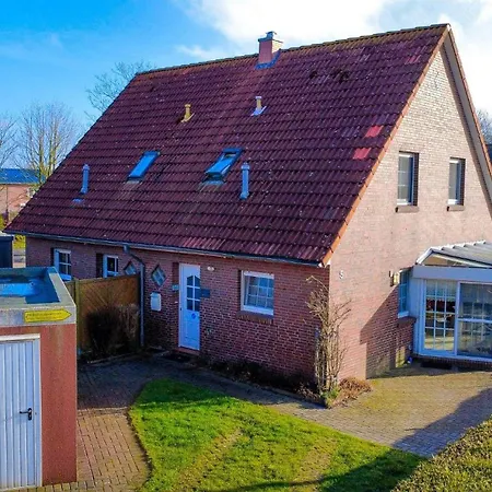 Ostfrieslandtraum-mit-kamin-und-wintergarten Holiday home *